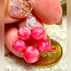 Dog paw pink jade like stone beaded pendant